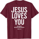 Jesus Loves You (1 John 4:19) Bible Verse (On Back) T-Shirt - T-Shirt | Maroon
