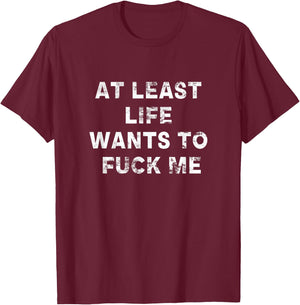 At Least Life Wants To Fuck Me | Funny Saying Vintage T-Shirt - T-Shirt | Maroon