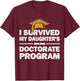 I Survived My Daughter's Doctorate Program Funny PhD Degree T-Shirt - T-Shirt | Maroon