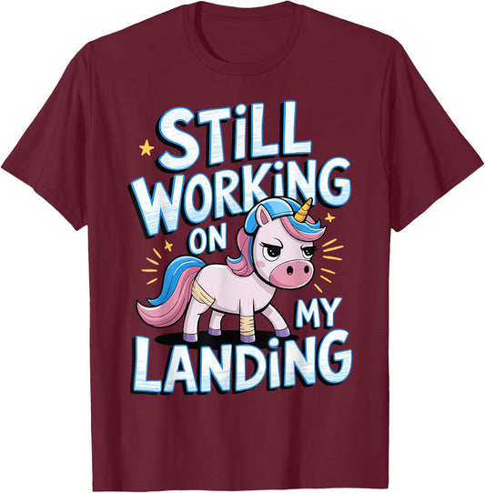 Still Working On My Landing Unicorn Broken Bone T-Shirt - T-Shirt | Maroon