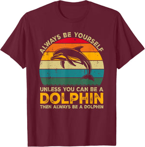 Always Be Yourself Unless You Can Be A Dolphin Funny Dolphin T-Shirt - T-Shirt | Maroon