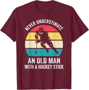 Never underestimate an old man with a hockey stick funny T-Shirt - T-Shirt | Maroon