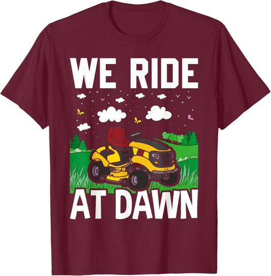 We Ride At Dawn Funny Lawnmower Lawn Mowing Riding Mowers T-Shirt - T-Shirt | Maroon
