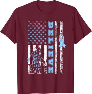 Believe Bigfoot Prostate Cancer Awareness US Flag T-Shirt - T-Shirt | Maroon