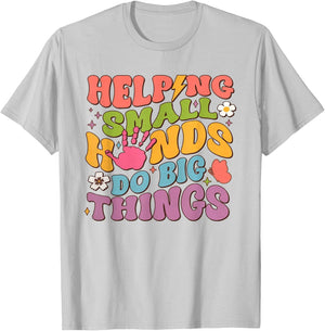 Helping Small Hands Do Big Things Teacher T-Shirt - T-Shirt | Ash
