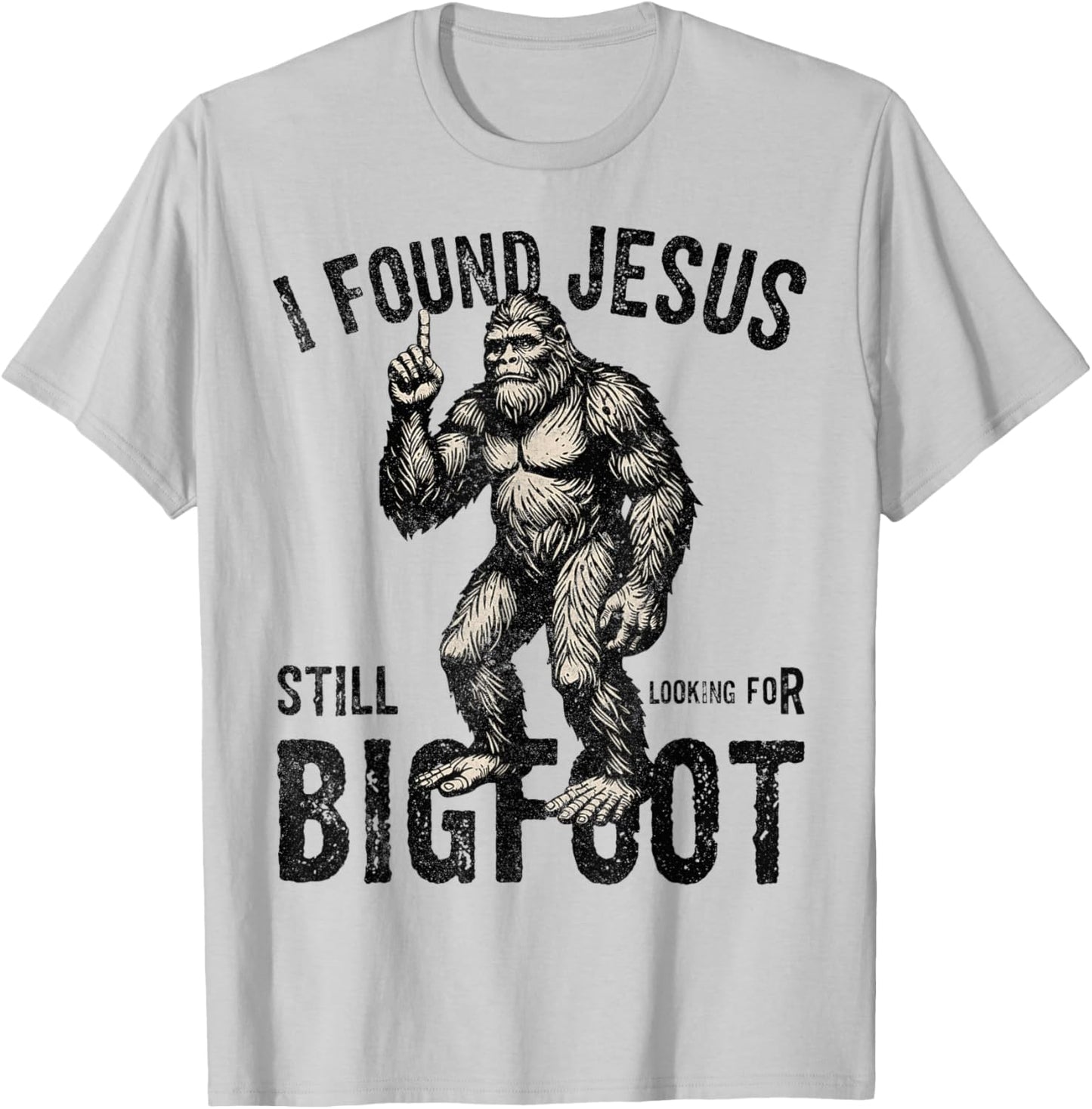I Found Jesus Still Looking for Bigfoot Funny Christian T-Shirt - T-Shirt | Ash