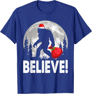 Believe! Santa Bigfoot Christmas Snow & Moon Night Graphic T-Shirt - T-Shirt | Royal
