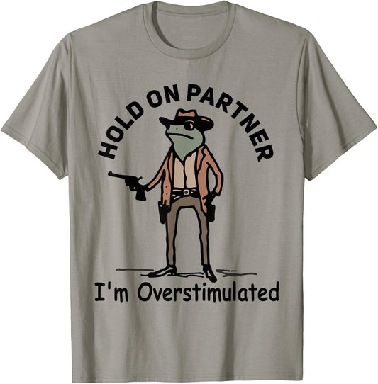 Hold On Partner I'm Overstimulated Funny Cowboy Frog Vintage T-Shirt - T-Shirt | Sand