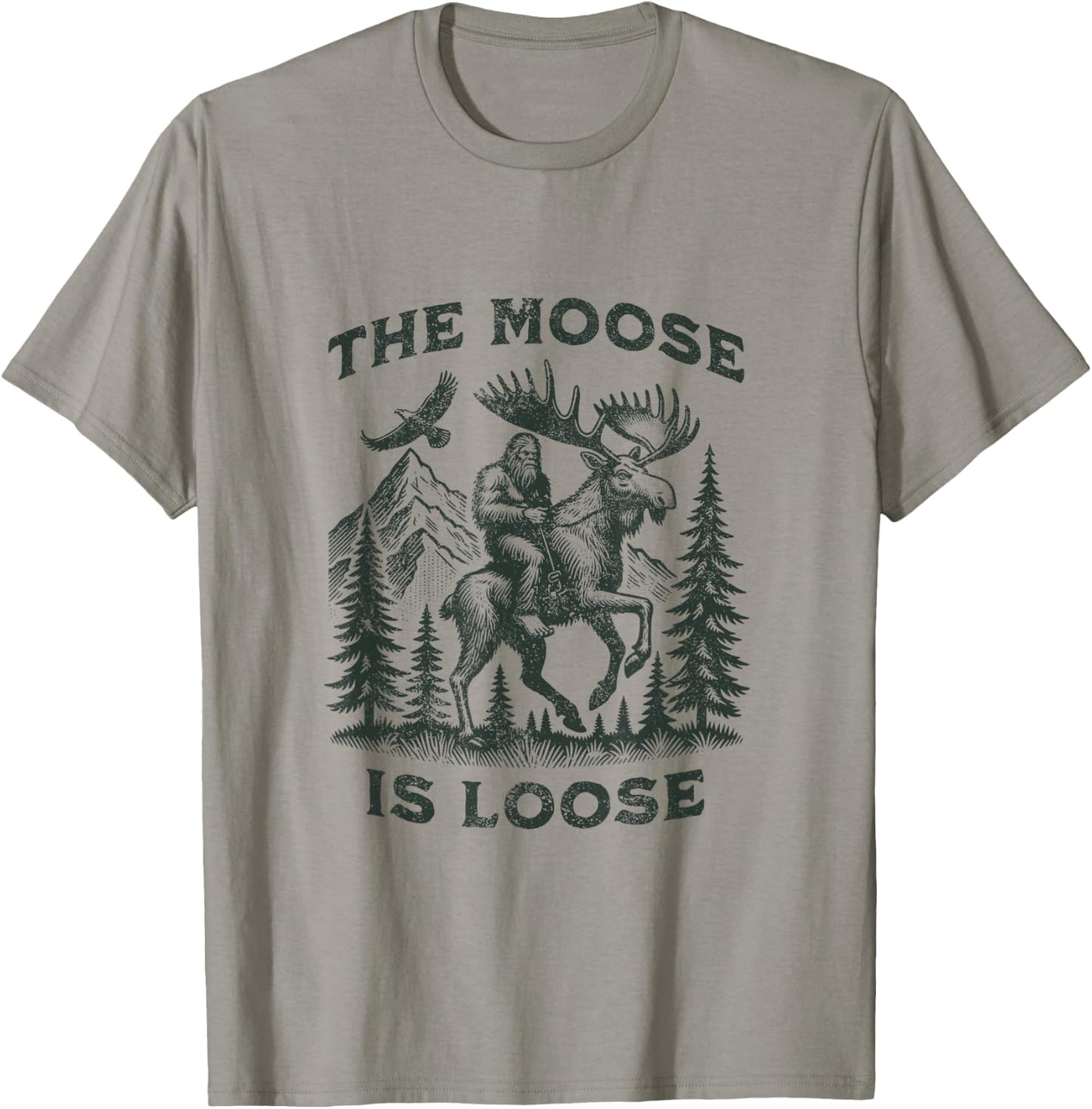 The Moose Is Loose Canada Alaska Funny Bigfoot Adventures T-Shirt - T-Shirt | Sand
