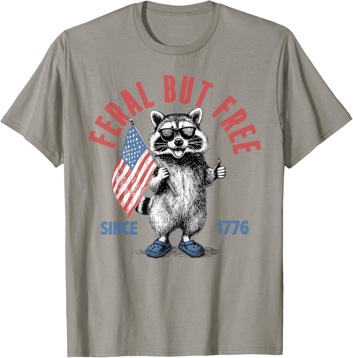 Feral But Free Since 1776 Funny Raccoon American 4th of July T-Shirt - T-Shirt | Sand