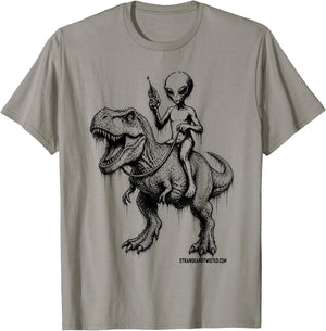 Alien Riding Dinosaur Funny Sci Fi Humor Gift T-Shirt - T-Shirt | Sand
